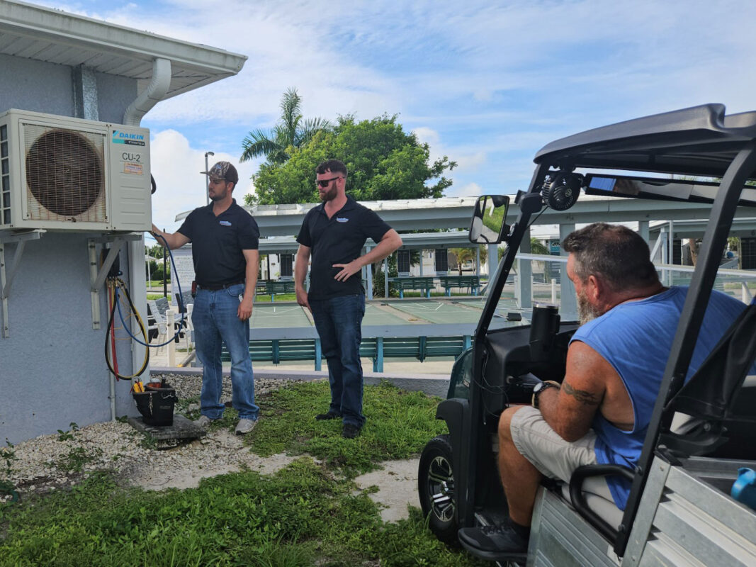 Extreme Temp Air Conditioning & Heating technicians on a Southwest Florida job