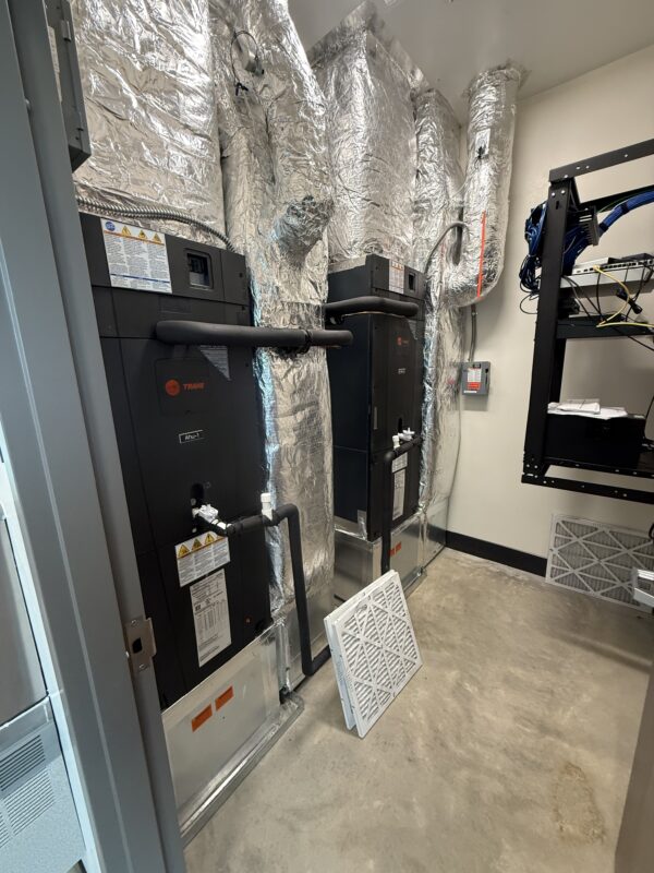 Two Trane air handlers in the mechanical room of a Naples, FL fire station, serviced by Extreme Temp